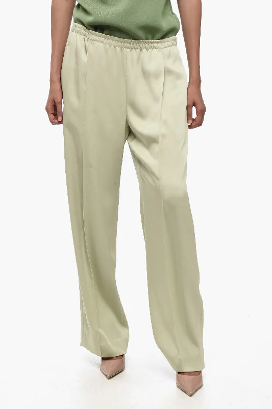 Classic high-waisted pants for office wear -Vince. Wide-leg Pleated Joggers